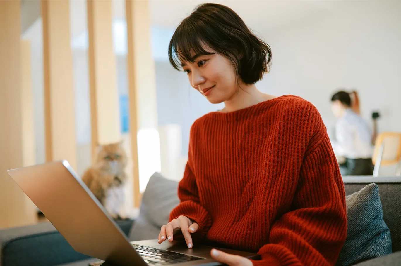 A test taker preparing for IELTS exam using her laptop