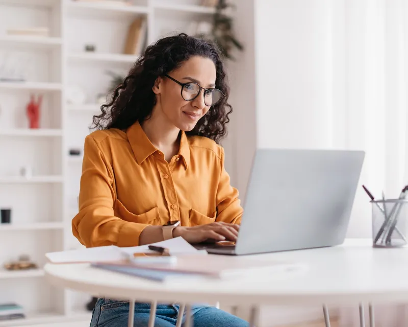 young-woman-online-study-laptop-home